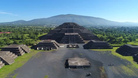 Aerial-view-of-pyramids-in-ancient-mesoamerican-city-of-Teotihuacan,-Pyramid-of-the-Moon,-Valley-of-Mexico-from-above,-Central-America,-4k-UHD