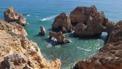 Aerial-view-of-Ponta-da-Piedade-rock-formations-in-Lagos,-Portugal