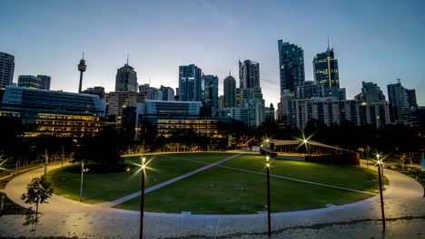 generic-modern-cityscape-timelapse-from-dusk-to-morning-with-foreground-park