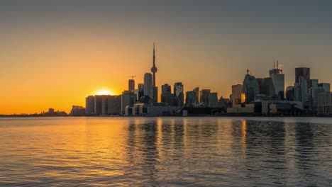 Reflexiones-de-Skyline-de-Toronto-Sunset-City-en-Polson-Pier