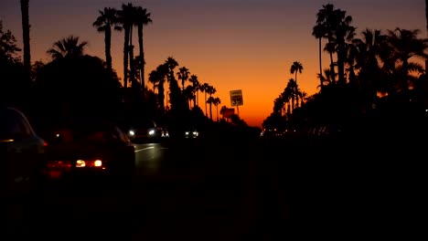 POV-driving-a-car-at-sunset-in-California-slow-motion