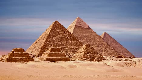 Timelapse-Of-The-Great-Pyramids-In-Giza-Valley,-Cairo,-Egypt.-Sunset-over-the-pyramids.