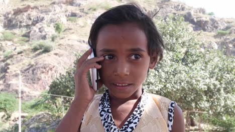 Lovely-little-Indian-talking-on-her-cell-phone-mobile