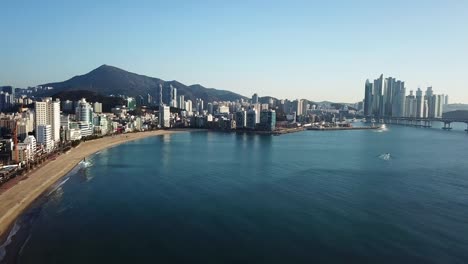 Gwangan-Bridge-and-Haeundae-aerial-view-at-Sunrise,-Busan,-South-Korea.