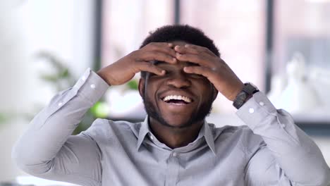 portrait-of-laughing-african-american-man