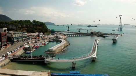 Aerial-view-of-Songdo-Beach-Skywalk,-Busan