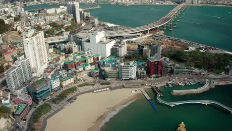 Aerial-view-of-Songdo-Beach-Skywalk,-Busan