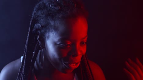 Portrait-of-Happy-Black-Woman-Talking-and-Laughing