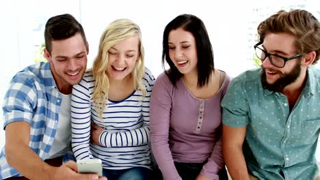 Smiling-casual-business-team-taking-selfies