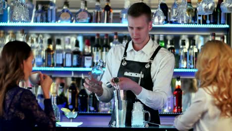 Barman-makes-cocktails-with-a-shaker