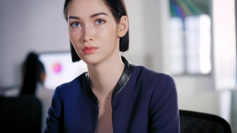 Portrait-of-successful-and-fashion-businesswoman-working-at-office-.-Close-up