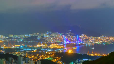 4K,-Time-lapse-View-of-Busan-at-night-with-a-bridge-of-South-Korea