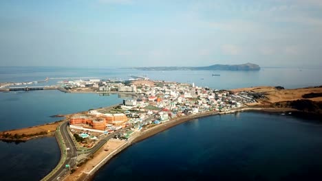 Aerial-view-Sunrise-at-Seongsan-Ilchulbong,-Jeju-Island,-South-Korea