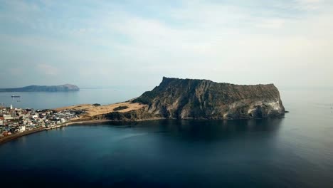 Aerial-view-Sunrise-at-Seongsan-Ilchulbong,-Jeju-Island,-South-Korea