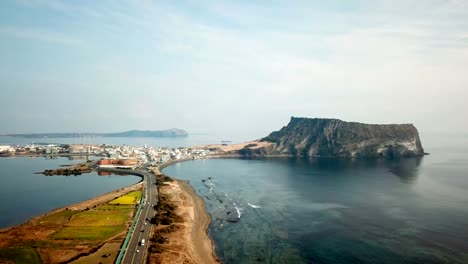 Aerial-view-Sunrise-at-Seongsan-Ilchulbong,-Jeju-Island,-South-Korea