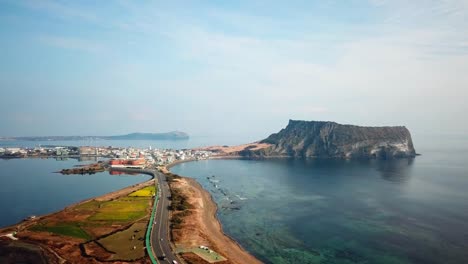 Aerial-view-Sunrise-at-Seongsan-Ilchulbong,-Jeju-Island,-South-Korea