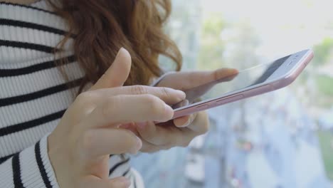 Young-Woman-use-of-mobile-phone