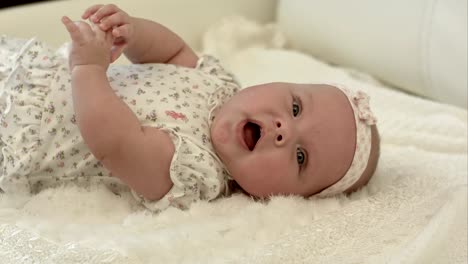 Crawling-baby-on-the-bed-in-her-room