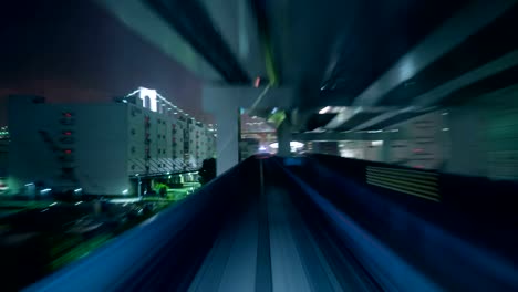 Time-lapse-of-automatic-train-moving-to-tunnel-in-Tokyo,-Japan.-4K