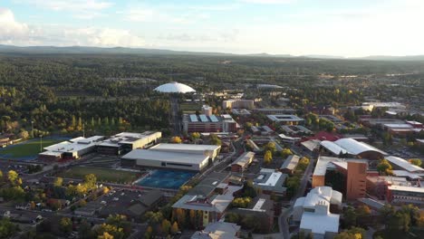 Aerial-drone-view-of-a-small-hilly-town,-Flagstaff-mountain,-Arizona,-USA