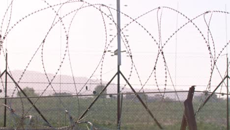 Border-fence-between-Israel-and-West-Bank.-barbed-wire-electronic-fence.