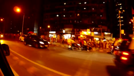 turn-on-crossroad-night-street-of-central-Bombey-view-from-car