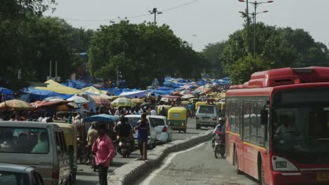 Time-lapse-shot-of-traffic-moving-on-city-street,-Delhi,-India