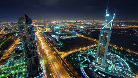 downtown-Dubai-Nachtlicht-Verkehr-Straße-Dach-Top-Panorama-4-k-Zeit-verfallen-Vereinigte-Arabische-Emirate