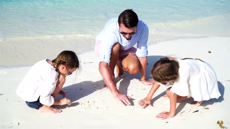 Happy-family-at-tropical-beach-have-fun.-Father-and-little-kids-enjoy-time-together-on-white-sand-beach-on-their-holiday