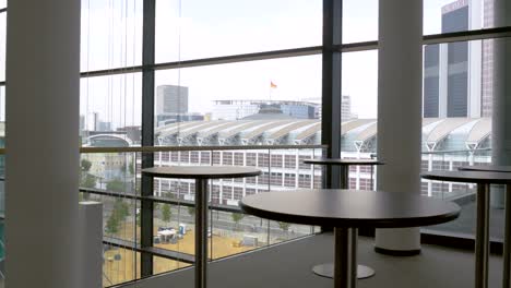 From-the-Interior-of-Building-Looking-Out-Towards-Glass-Towers-Outside