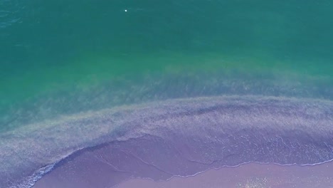 Aerial-Beach-washing-on-beach