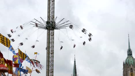Swing-carousel-at-the-central-street-of-the-Oktoberfest-beer-festival.-Bavaria,-Germany
