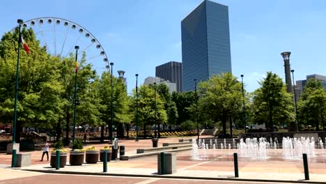 Atlanta-Centennial-Olympic-Park-Motion-Time-Lapse-with-sky-view-Ferris-wheel