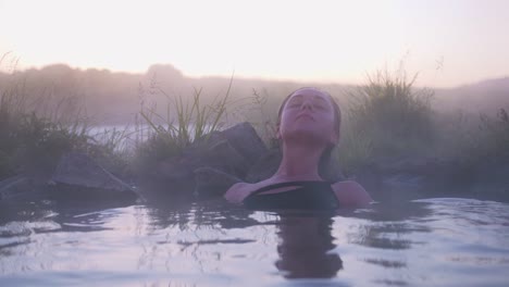 young-woman-relaxing-in-hot-springs