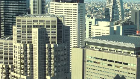 Aerial-Footage-of-the-Big-Cityscape,-with-Skyscrapers-and-Busy-Traffic.-Daytime-in-the-Megapolis-City.