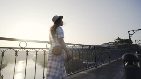 Happy-young-women-walking-on-high-top-bridge