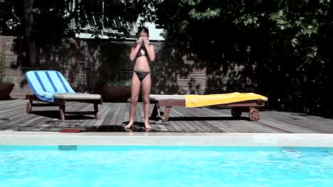 Girl-jumping-into-pool