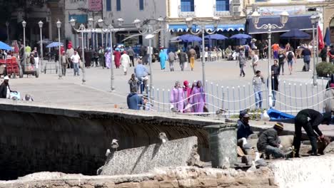 People-walking-on-a-pedestrian-square-in-Essouira