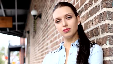 Portrait-of-pretty-businesswoman-entrepreneur-outside-business