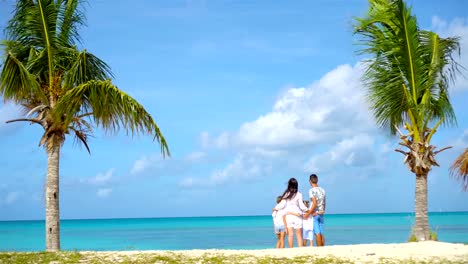 Parents-with-two-kids-enjoy-their-caribbean-vacation-on-Antigua-island