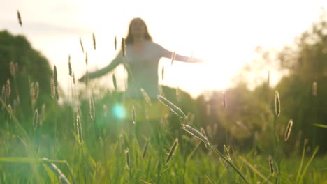 Woman-enjoy-life,-dance-and-whirl-in-green-field