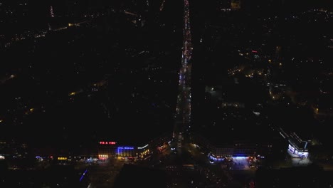 Bird's-eye-view-of-beautifully-lit-Paris-streets-at-night