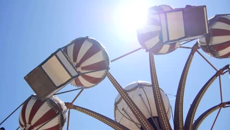 Attraction-in-amusement-park-spinning-over-the-sun