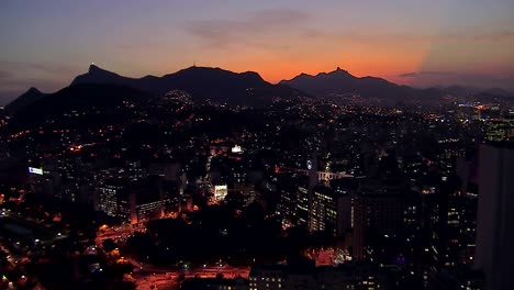 Flying-above-Rio-de-Janeiro-at-Night-with-famous-Carioca-Aqueduct,-Brazil