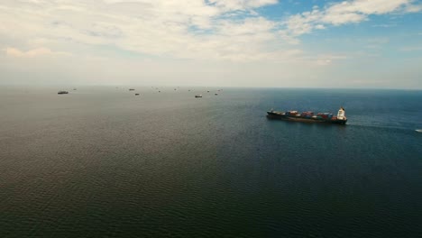 Aerial-Cargo-ships-anchored-in-the-sea.-Philippines,-Manila