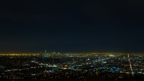 Los-Angeles-en-vista-de-noche-de-lapso-de-tiempo-de-Observatorio-Griffith