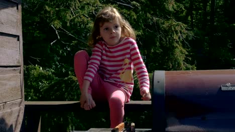 Child-Playing-on-the-Cottage-Porch