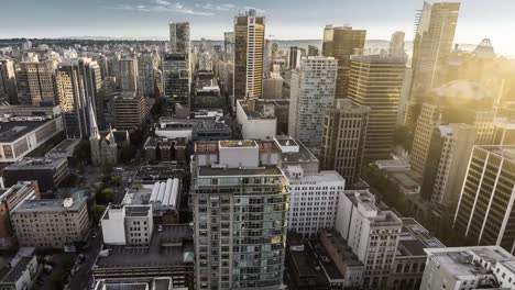 Moving-Day-to-Night-Timelapce-from-Vancouver-Looukout-BC-Canada-towards-Downtown-City-during-Sunset