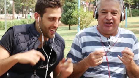 Father-and-Son-listening-music-and-having-fun