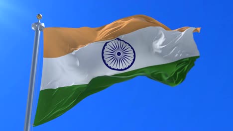 Flag-of-India-waving-at-wind-in-slow-in-blue-sky,-loop